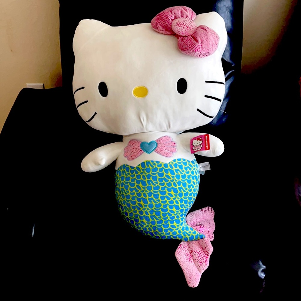 Hello kitty plush, 3 feet long, 1.5 feet wide